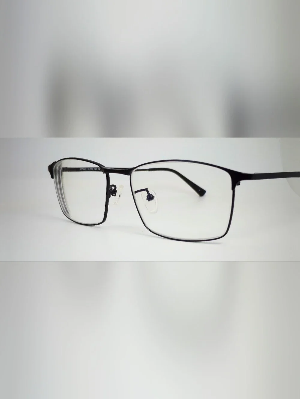 Decider. Womens Black Low Gloss Rectangular Titanium Frame.